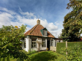 Гостиница Fairytale Cottage in Nes Friesland with garden and terrace  Нес